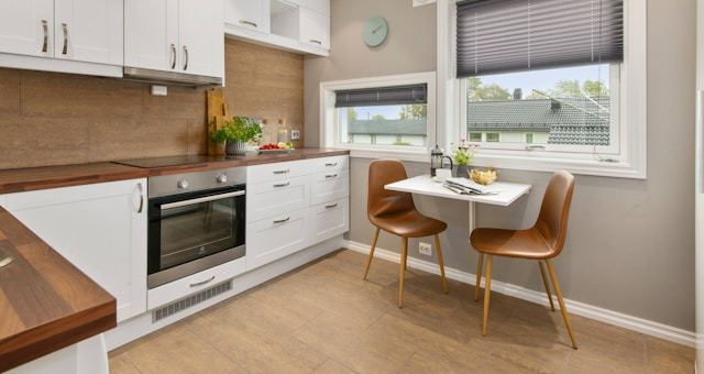 Kitchen and dining area with painted walls