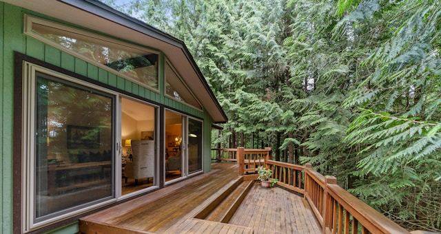Timber deck and cladding under a protective coating